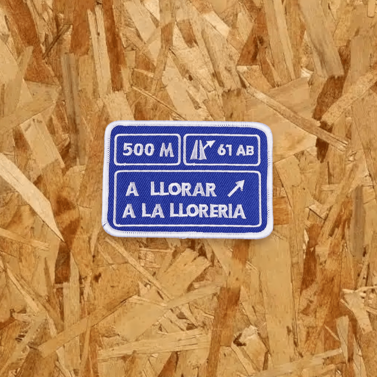 Pegat amb velcro: A LLORAR A LA LLORERIA (Blau)