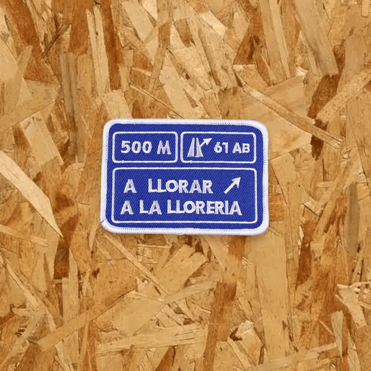 Pegat amb velcro: A LLORAR A LA LLORERIA (Blau)