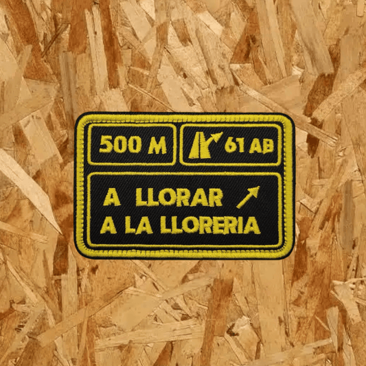 Pegat amb velcro: A LLORAR A LA LLORERIA (Negre i Groc)
